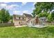 Large backyard with deck and chimney at 8429 Meadowcroft Ct, Charlotte, NC 28215