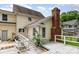 Back exterior with deck and chimney at 8429 Meadowcroft Ct, Charlotte, NC 28215