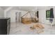 Spacious bedroom with marble floors, unique wooden play structure, and ample natural light at 8429 Meadowcroft Ct, Charlotte, NC 28215