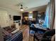 Open kitchen features updated cabinets, appliances, and an adjacent dining area for entertaining at 8827 Spring Meadow Dr, Hickory, NC 28601