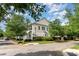 Corner lot showcasing a two-story townhouse with manicured landscaping at 939 White Point Dr, Huntersville, NC 28078