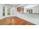 Cozy breakfast nook adjacent to the kitchen with plenty of natural light from the bay window at 939 White Point Dr, Huntersville, NC 28078