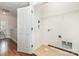 Spacious laundry room with tile floor and a door to another room at 939 White Point Dr, Huntersville, NC 28078