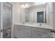 Bathroom featuring double sinks, vanity, and a shower and tub combo at 1004 Earlston Rd, Indian Trail, NC 28079