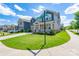 Attractive two-story home with a well-kept lawn on a corner lot in a residential neighborhood at 1004 Earlston Rd, Indian Trail, NC 28079