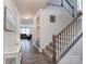 Bright foyer featuring hardwood floors and a view of the staircase at 1004 Earlston Rd, Indian Trail, NC 28079