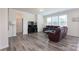 Spacious living room with modern furnishings and a TV, ideal for relaxation and entertainment at 1004 Earlston Rd, Indian Trail, NC 28079