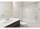 Bathroom with a shower and bathtub combination, a white toilet, and sink with vanity at 1020 Bannister Rd, Waxhaw, NC 28173