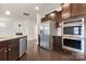 Spacious kitchen with stainless steel appliances and open layout to the living area at 1020 Bannister Rd, Waxhaw, NC 28173