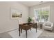 Inviting home office featuring a decorative painting and ample natural light at 1020 Bannister Rd, Waxhaw, NC 28173