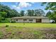 Charming single story home with a well-maintained lawn and mature trees at 1038 Blake Rd, Albemarle, NC 28001