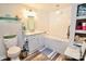 Bright bathroom with a tiled tub, a vanity with ample storage, and modern fixtures for a clean and stylish space at 105 Venus Ave, Gastonia, NC 28052