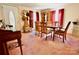Cozy dining room with a wooden table set, ample seating, and decorative accents at 105 Venus Ave, Gastonia, NC 28052