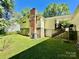 Exterior showcasing the backyard, with stairs leading to deck at 105 Venus Ave, Gastonia, NC 28052
