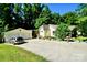 Charming home with two-car garage, ample parking, and landscaped front yard at 105 Venus Ave, Gastonia, NC 28052