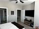 Cozy bedroom with view of bathroom and open stairway at 110 W Pine St, Lincolnton, NC 28092