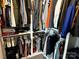 Organized walk-in closet with clothing racks, shelves, and compartments for efficient storage at 110 W Pine St, Lincolnton, NC 28092