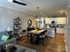 Open-concept living room and kitchen with eat-in dining area and modern finishes at 110 W Pine St, Lincolnton, NC 28092