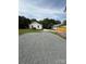 View of the backyard and adjacent fence, enhancing the property's privacy and outdoor enjoyment at 1102 Venus St, Kannapolis, NC 28083