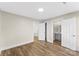 A bright bedroom with updated flooring, neutral walls, and easy access to an attached bathroom at 1102 Venus St, Kannapolis, NC 28083