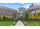 Commercial property with businesses and restaurants, featuring a vibrant, modern design with well-maintained landscaping and trees at 11209 Flenniken Ct, Charlotte, NC 28277
