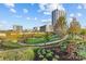 A scenic view of a park area within the community, featuring lush landscaping and modern architecture at 11209 Flenniken Ct, Charlotte, NC 28277