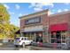 City Barbeque exterior showcasing its brick facade, glass windows, and signage, under a blue sky at 11209 Flenniken Ct, Charlotte, NC 28277