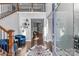 Inviting two-story foyer with hardwood floors, staircase, and stylish accents providing a warm welcome at 11209 Flenniken Ct, Charlotte, NC 28277
