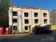 A new three-story residential building under construction showing the exterior walls and roof structure at 113 Verbena Ne St # 11, Charlotte, NC 28217