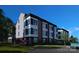 Modern townhome exterior showcasing architectural details, large windows, and landscaping at 113 Verbena Ne St # 11, Charlotte, NC 28217