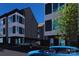 Apartment building exterior showing modern design with large windows and green surroundings at 113 Verbena Ne St # 11, Charlotte, NC 28217