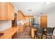 Charming kitchen with wooden cabinets, stainless steel appliances, and island seating at 114 Elmwood Dr, Salisbury, NC 28147