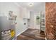 Functional laundry room with storage shelves and water heater at 114 Elmwood Dr, Salisbury, NC 28147
