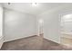 Neutral bedroom with carpet, window for natural light, closet and en-suite bath access at 1142 Doveridge St, Charlotte, NC 28273