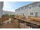Unit deck overlooking the neighborhood with flower pot accents, provides private outdoor space at 1142 Doveridge St, Charlotte, NC 28273