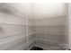 Spacious walk-in pantry with extensive wire shelving for optimal storage and organization at 1142 Doveridge St, Charlotte, NC 28273