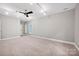 Spacious bedroom with neutral colors, ceiling fan, and natural light at 12711 Duncourtney Ln, Charlotte, NC 28277