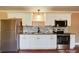 Bright kitchen features stainless steel appliances, granite counters, and a modern tile backsplash at 1306 Abbey Ct, Lancaster, SC 29720