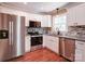 Bright, updated kitchen featuring stainless steel appliances and stone countertops at 1306 Abbey Ct, Lancaster, SC 29720