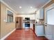 Well-equipped kitchen with stainless steel appliances, stone countertops, and white cabinetry at 1306 Abbey Ct, Lancaster, SC 29720