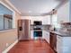 Modern kitchen with stainless steel appliances, granite countertops, and sleek cabinetry at 1306 Abbey Ct, Lancaster, SC 29720
