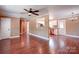 Open-concept living space flowing into an updated kitchen with stainless steel appliances at 1306 Abbey Ct, Lancaster, SC 29720