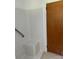 Bathroom features white tiles and a built-in seat at 1412 Beverly Ave, Shelby, NC 28152