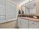 Bright bathroom with marble countertop and white cabinets at 15 Old Stage Trl, Clover, SC 29710