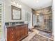 Renovated bathroom with modern vanity, walk-in shower, and custom tile work at 15 Old Stage Trl, Clover, SC 29710
