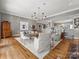 Open-concept living room with elegant furnishings and access to the rest of the home at 15 Old Stage Trl, Clover, SC 29710