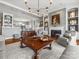 Stylish living room with a fireplace, built-in shelves, and views into other rooms at 15 Old Stage Trl, Clover, SC 29710