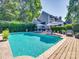 Inviting pool area with lounge chairs and umbrellas perfect for outdoor relaxation at 15 Old Stage Trl, Clover, SC 29710