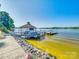 Picturesque waterfront featuring a dock, gazebo, boat, and views of the serene lake at 15 Old Stage Trl, Clover, SC 29710