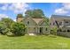 Home exterior with landscaping and backyard with a patio at 1500 Lynway Dr, Charlotte, NC 28203